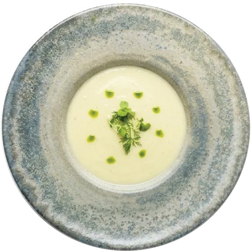 Chilled soup with herb oil
